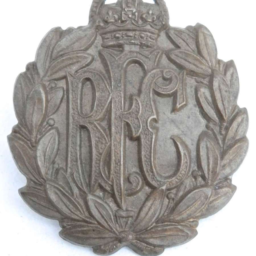 RFC economy brass cap badge